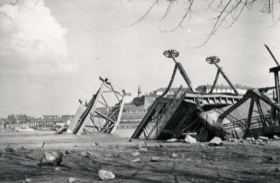 Remains of the destroyed road bridge, with Petrovaradin behind, Prince Tomislav Bridge, Novi Sad, 1941