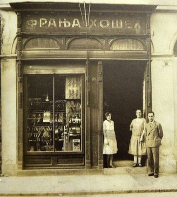 A hardware and cutlery shop, with its owners in the doorway, Dunavska Street, Novi Sad, 1930