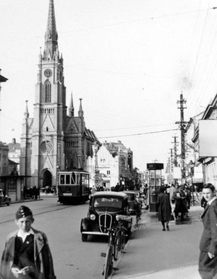 Parked cars beside the church, Liberty Square, Novi Sad, 1942